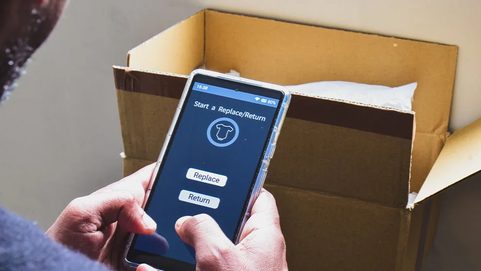 hand typing on mobile phone screen