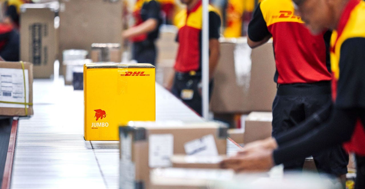 dhl employees checking air waybill