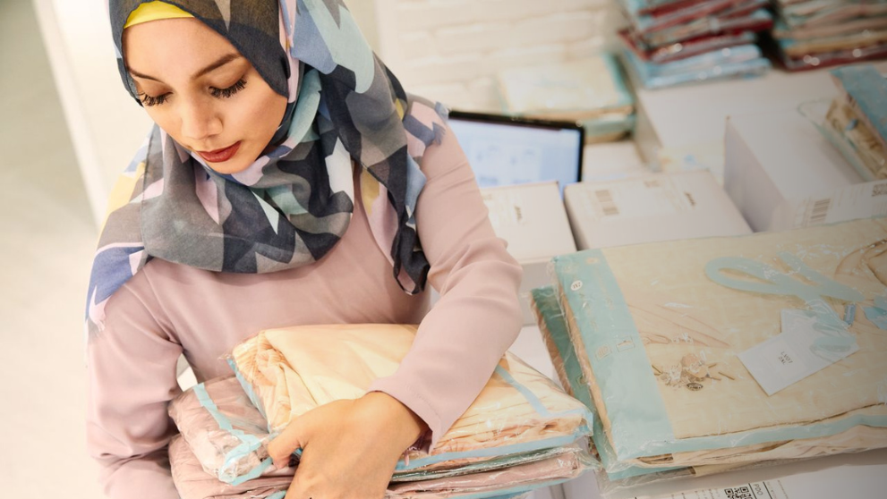 veiled business lady preparing her shipments