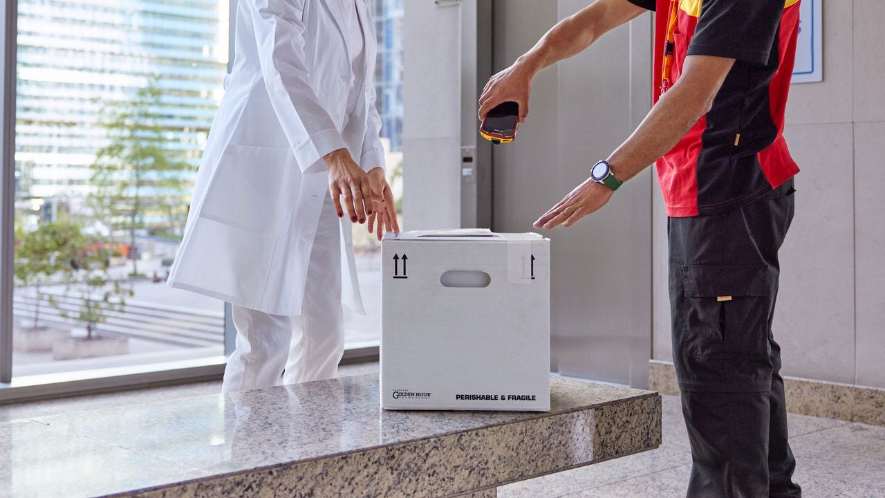 courier picking up a shipment for clinical trial research