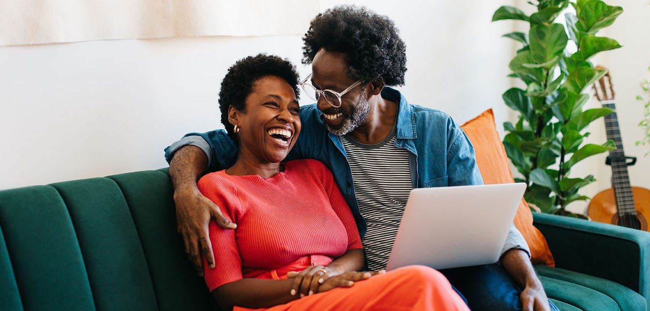man and woman smiling at each other
