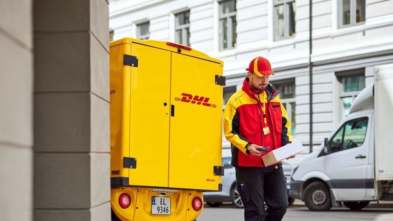 DHL Express employee delivering for Australian Fashion Week