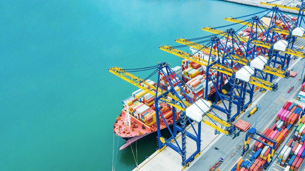 Container ship being loaded at a Brazilian port with goods for export