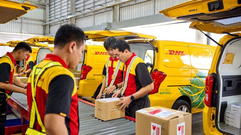 DHL Express employees taking part in the sustainable logistics management of deliveries in Bangladesh