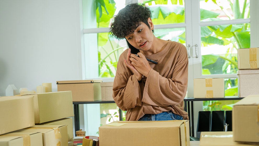 woman packing boxes