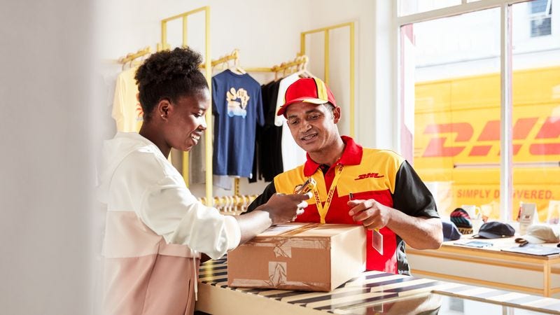 dhl courier delivering woman’s parcel on the same day
