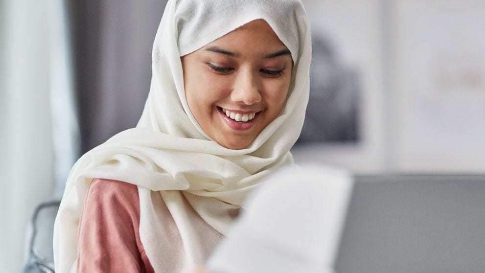 lady opening a parcel ordered through a social media advertisement
