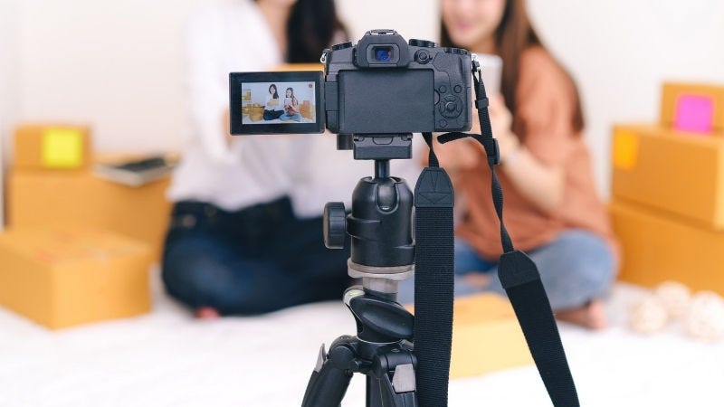 Inline Static ( 800x450)  - Two woman taking videos for their products.