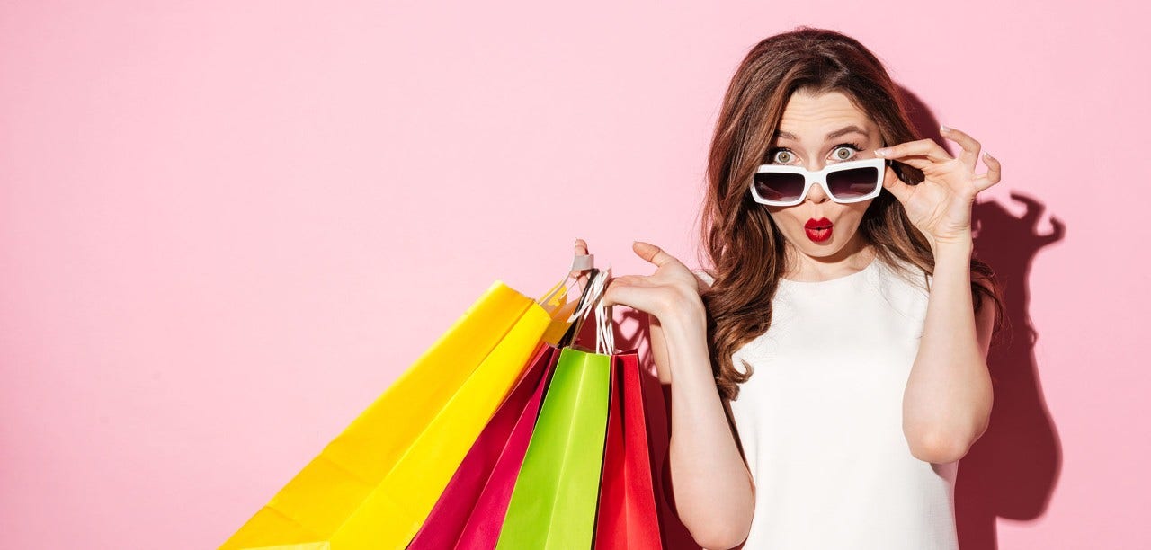 woman holding shopping bags