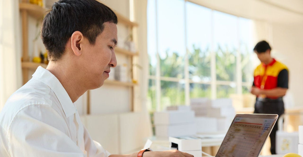 f-commerce business owner  in Bangladesh checking products for shipping