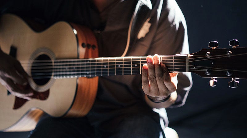 man playing guitar