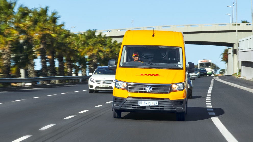 DHL van driving on motorway