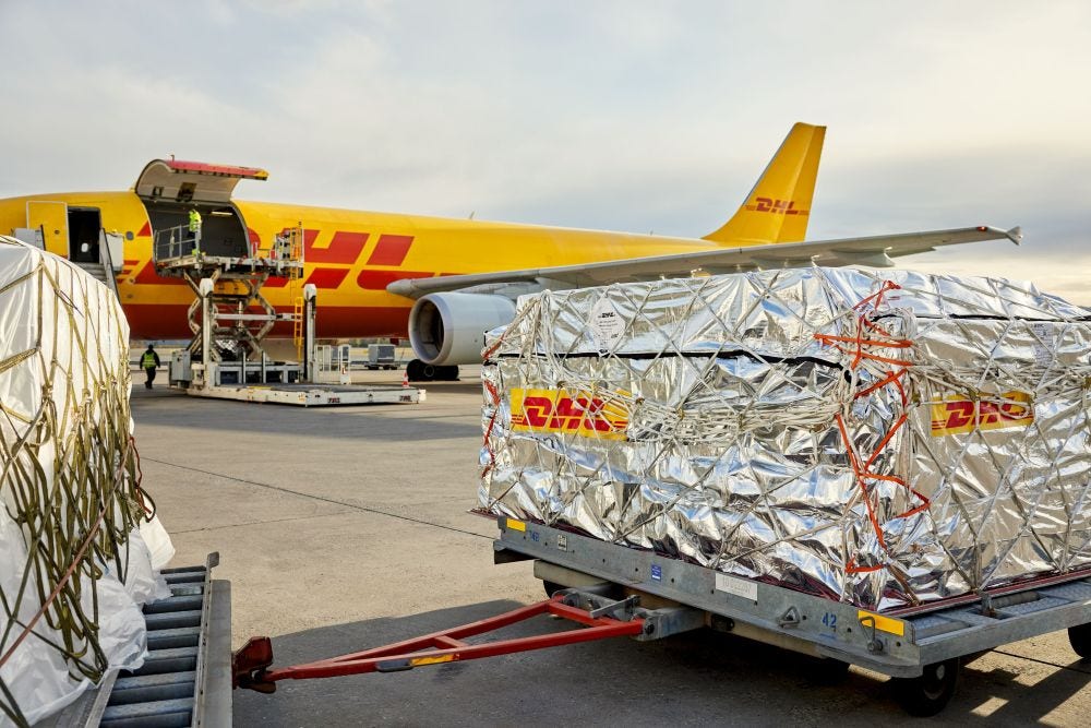 large cargo shipment loading onto airplane
