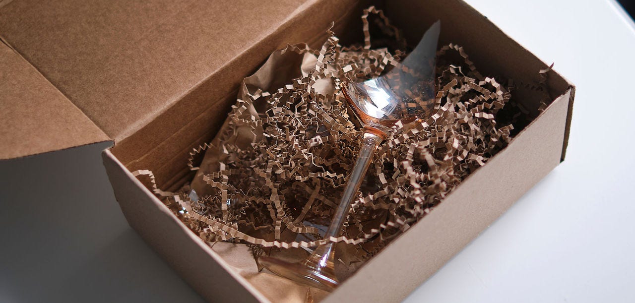 wine glass in  brown box