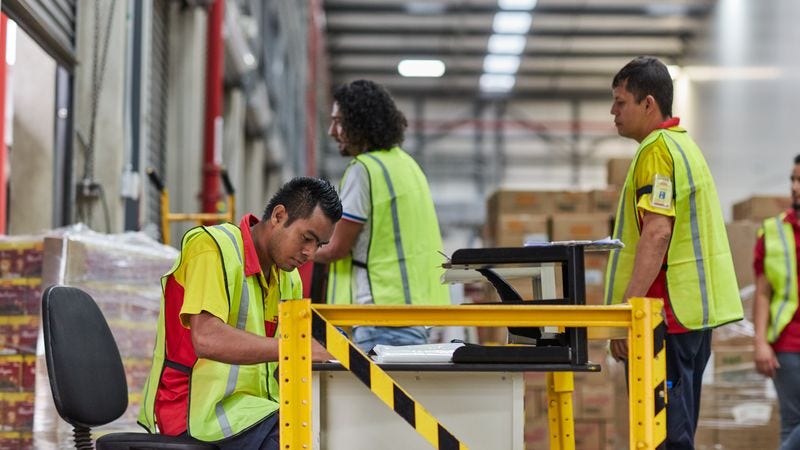 dhl staff prepping logistics