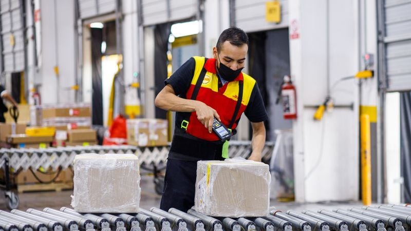 DHL Express parcels being scanned