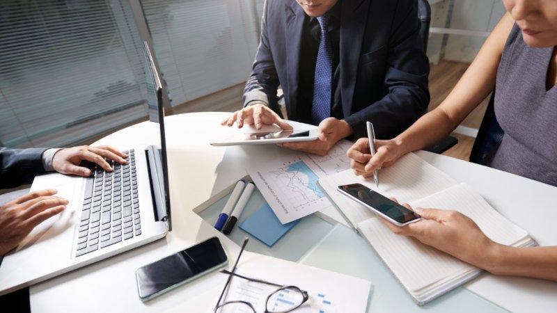 Business people working on data project.