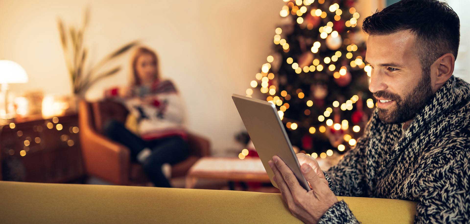 man holding a tablet