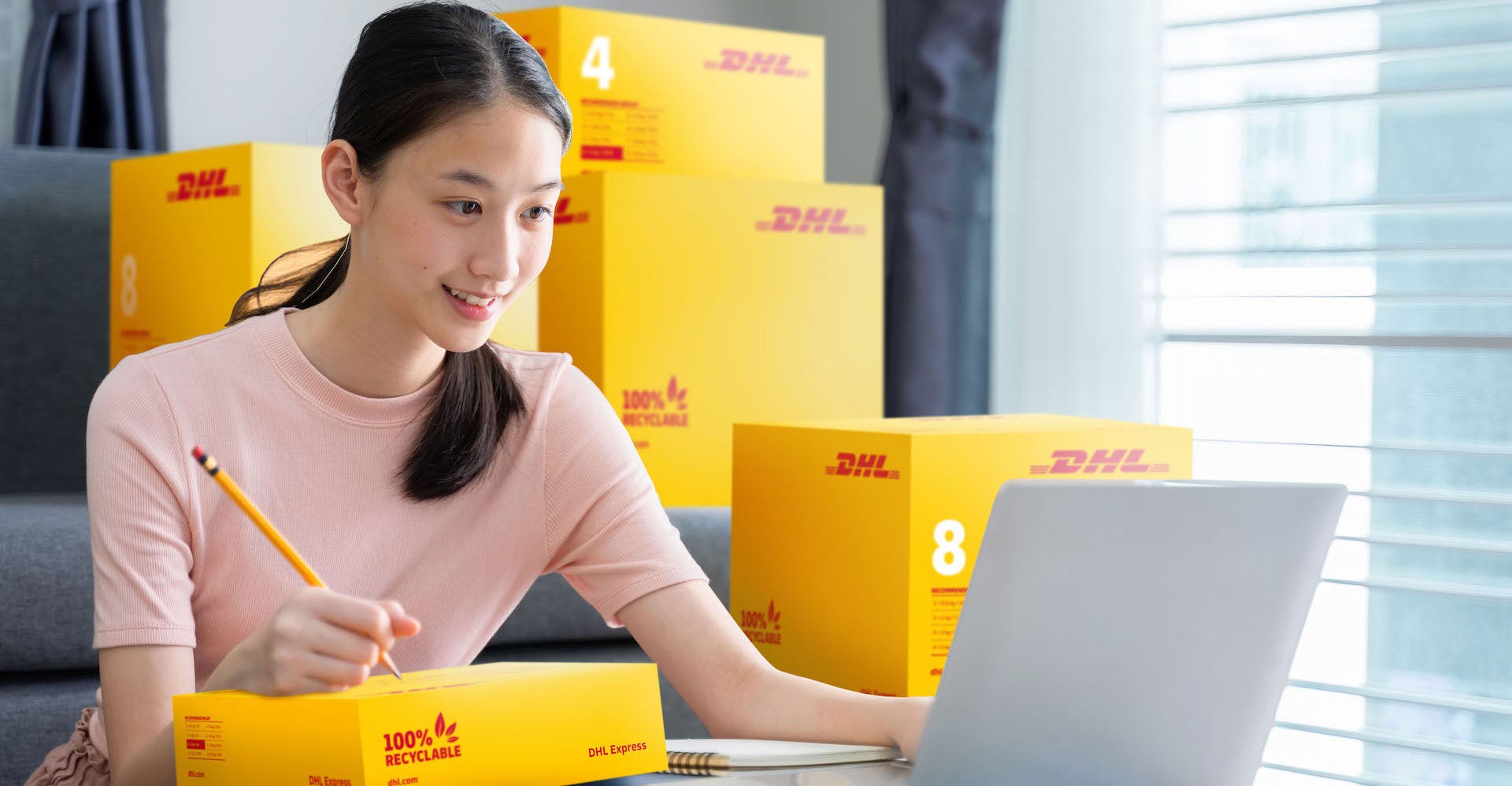 Attractive asian young teenage start up running small business owner preparing parcel boxes for deliver to customer. Home business concept; Shutterstock ID 1524837452; Purchase Order: -