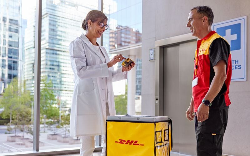 dhl express worker delivering temperature sensitive package to a medical professional in cambodia