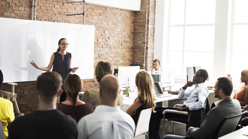 woman addressing an audience