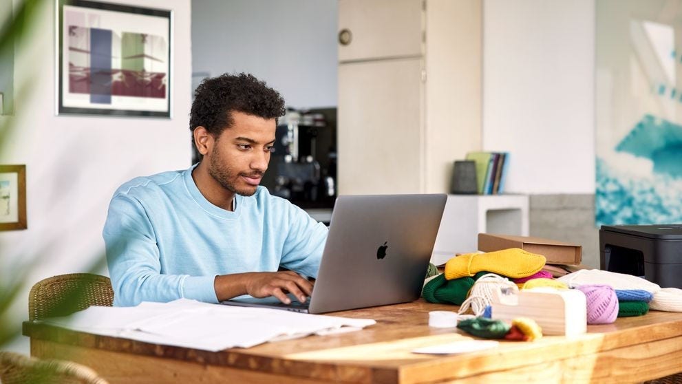 Small business manager opens Brazil's Siscomex portal on a laptop to register for Radar