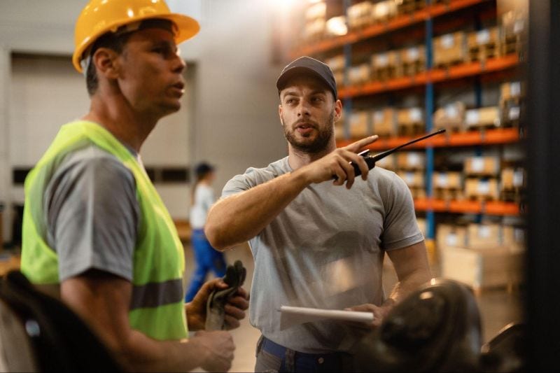 two men conducting warehouse inspection