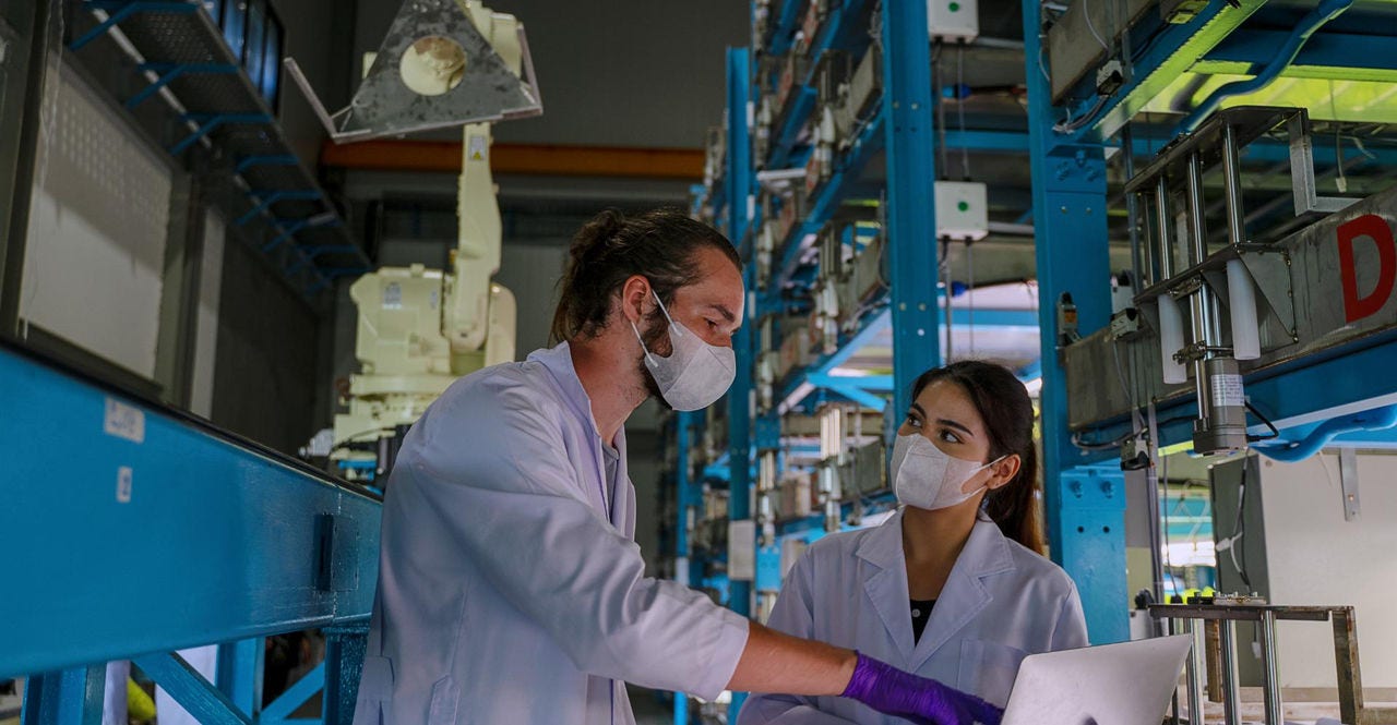 Laboratory staff planning their supply chain operations