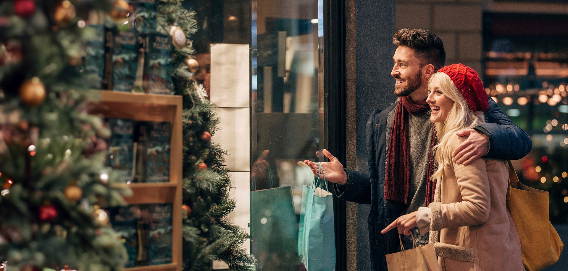 man and woman window shopping