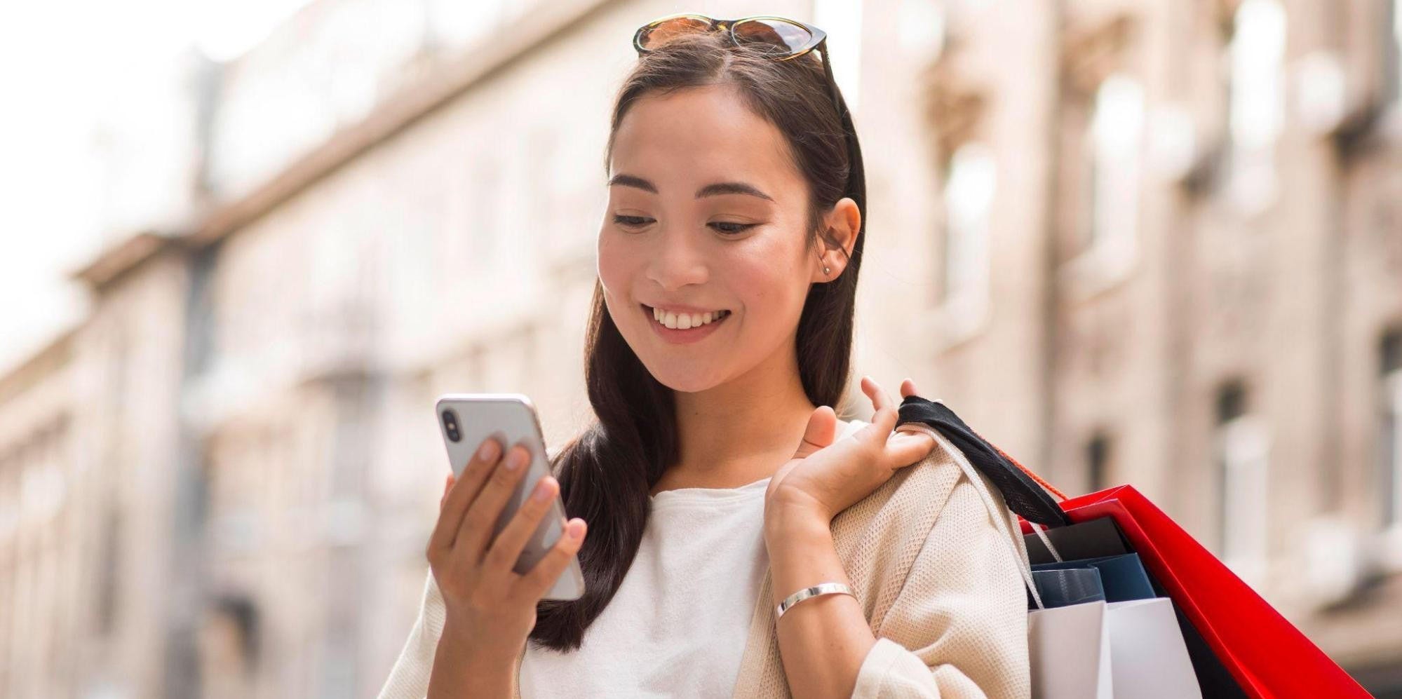 A Japanese woman engaging in mobile commerce