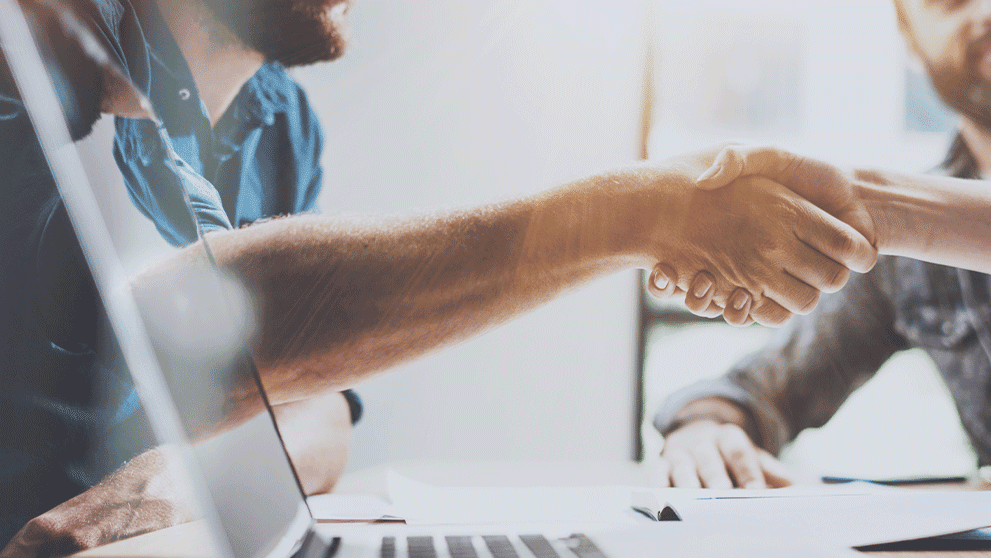 two people shaking hands