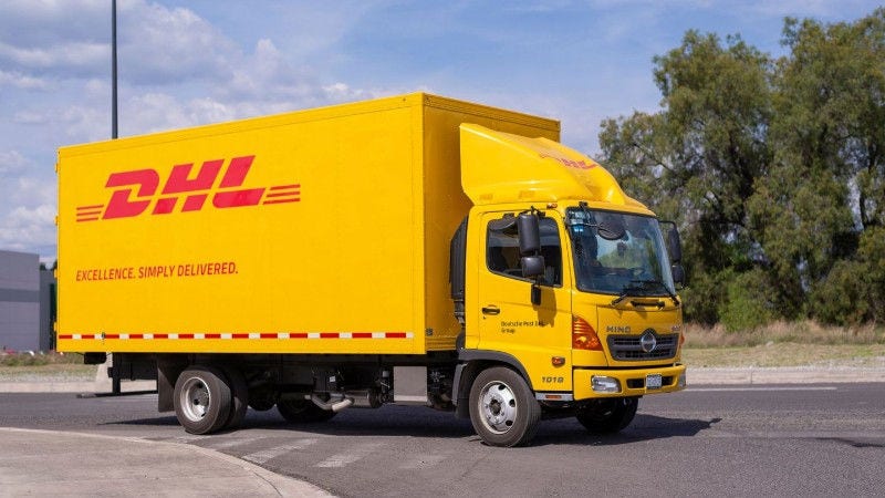 a dhl express truck shipping garments from indonesia