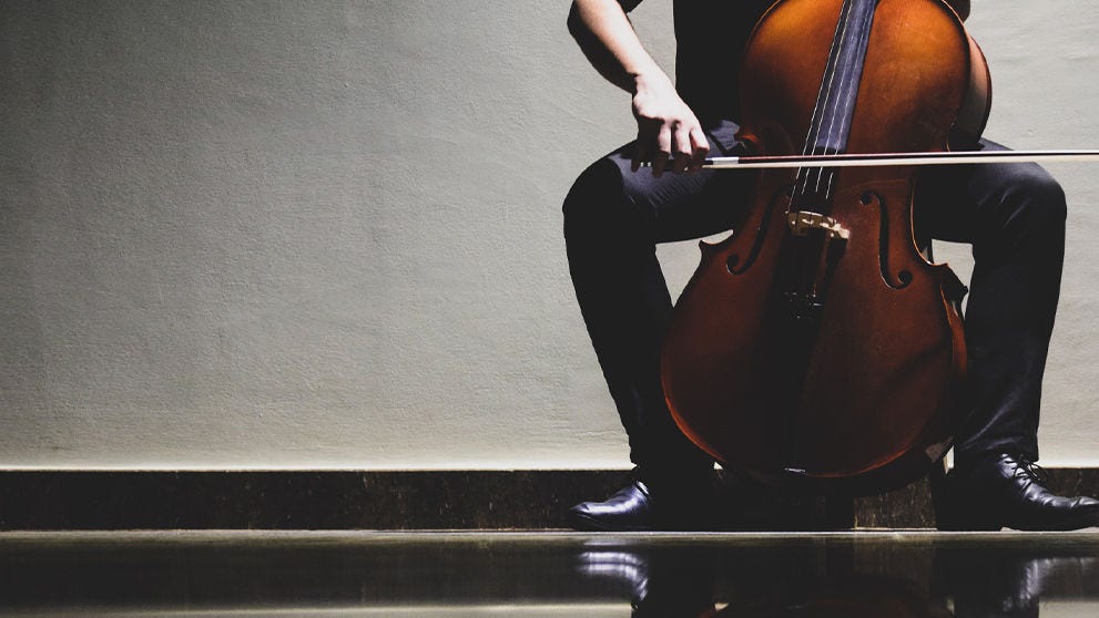 hand playing a guitar