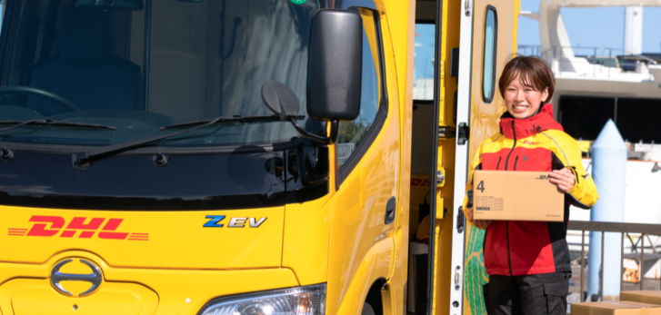 dhl courier on delivery route