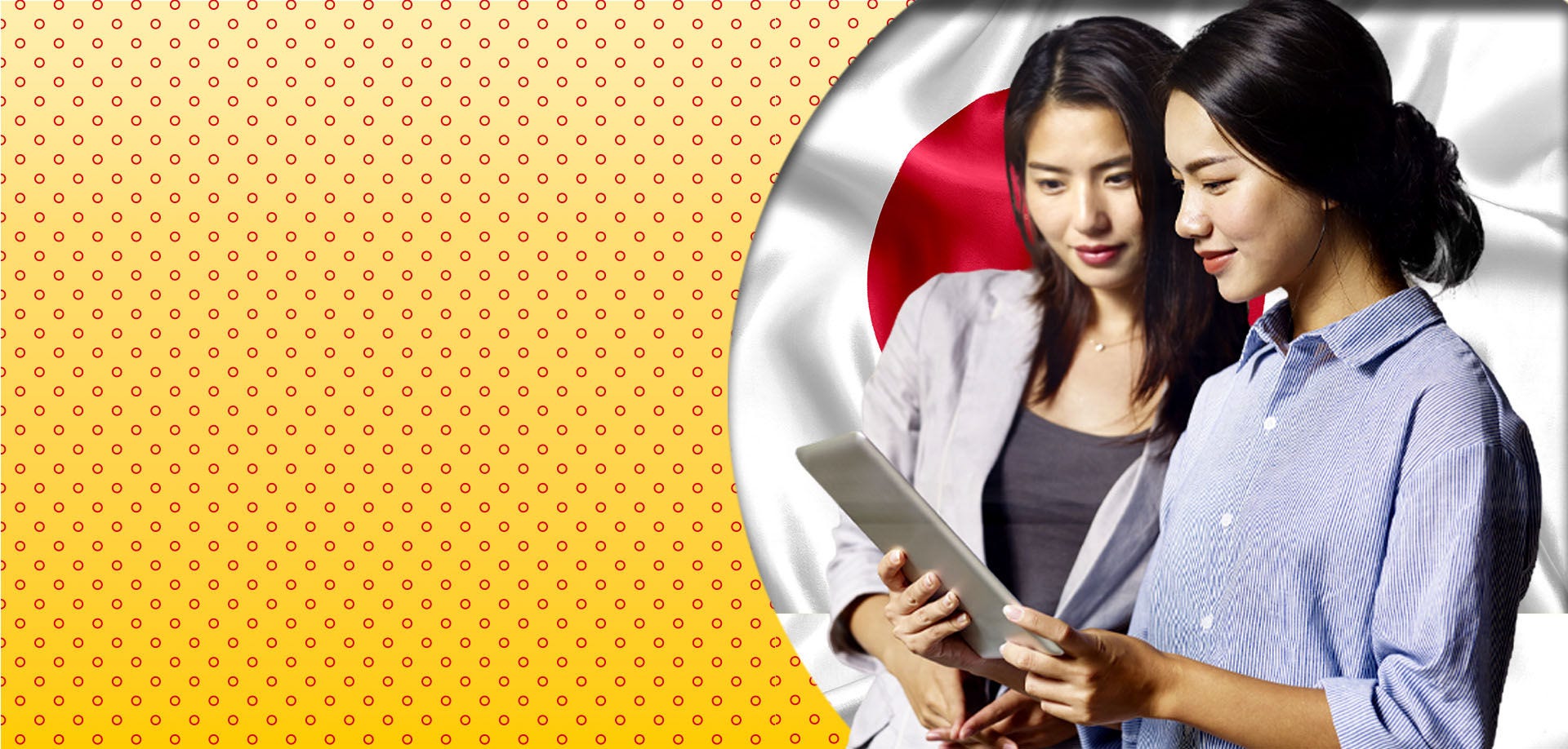 two ladies looking at tablet screen