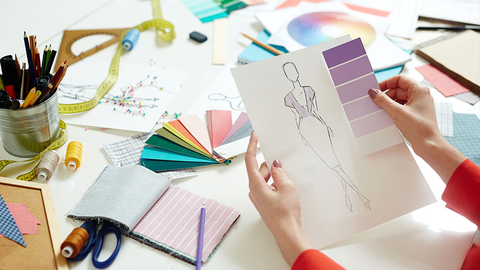 An Australian fashion designer choosing her new dress’ colour