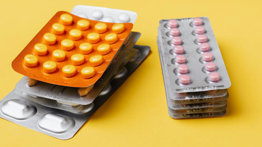 Two stacks of blister packs containing health supplements for importing to Australia
