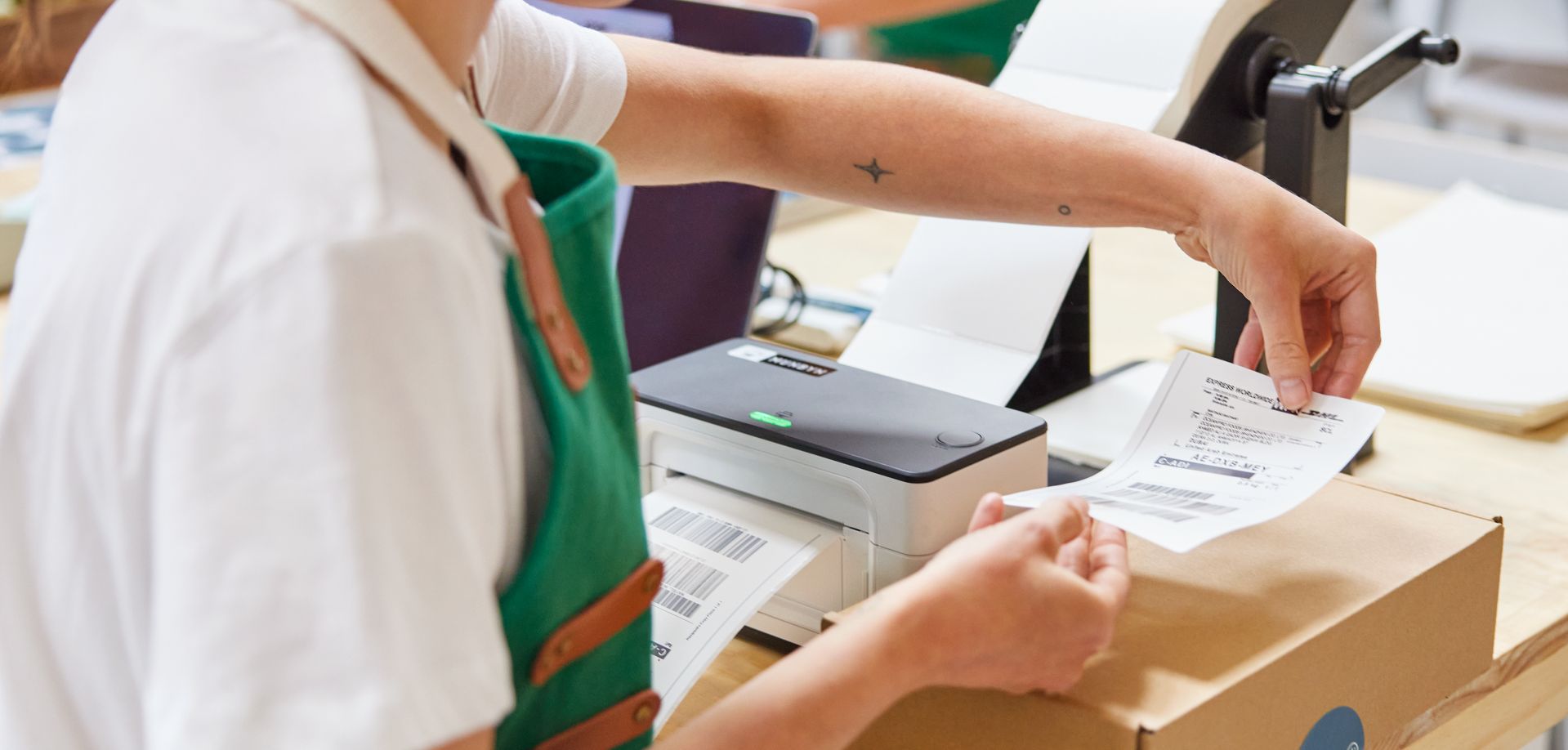 employee preparing package to be exported to South Korea