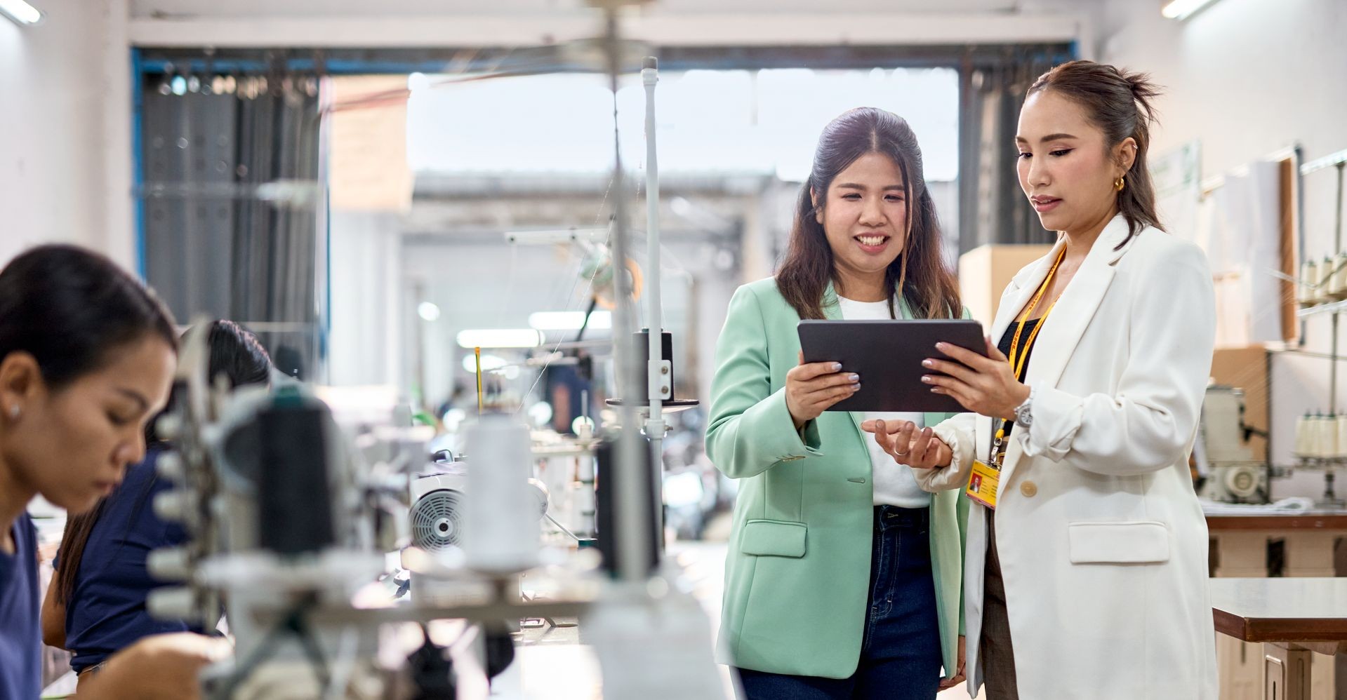 a business owner discussing import requirements from pakistan to bangladesh with a dhl employee