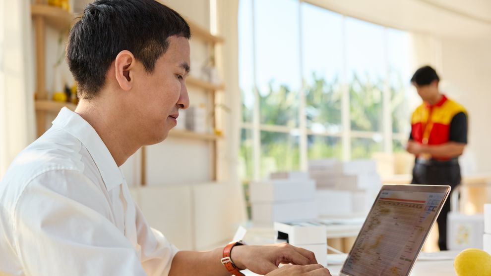 f-commerce business owner  in Bangladesh checking products for shipping