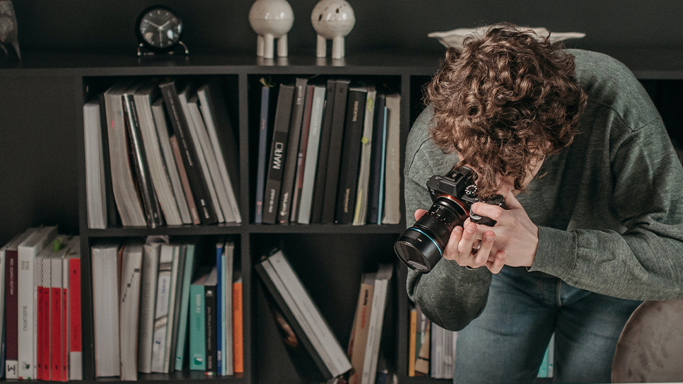 man taking photographs