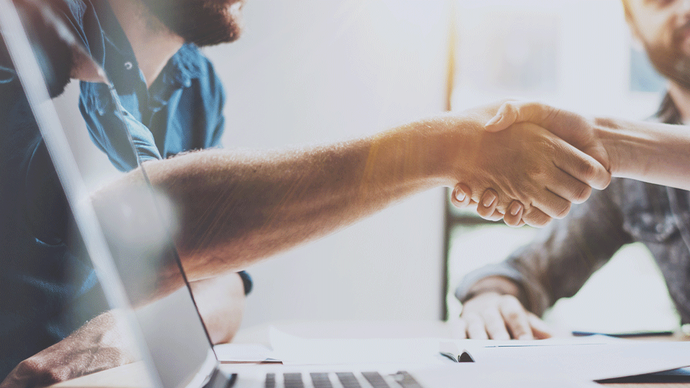 two people shaking hands