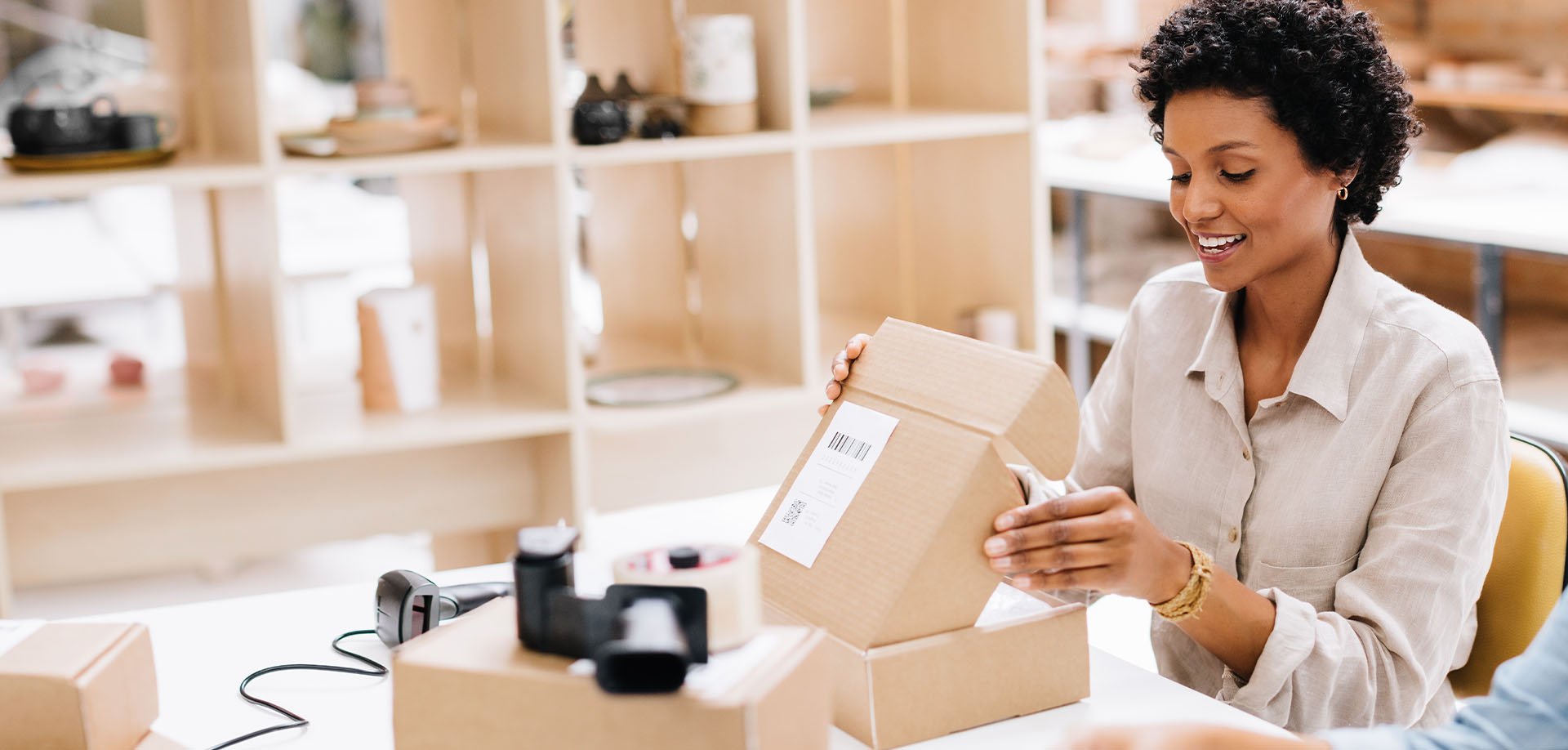 woman opening package
