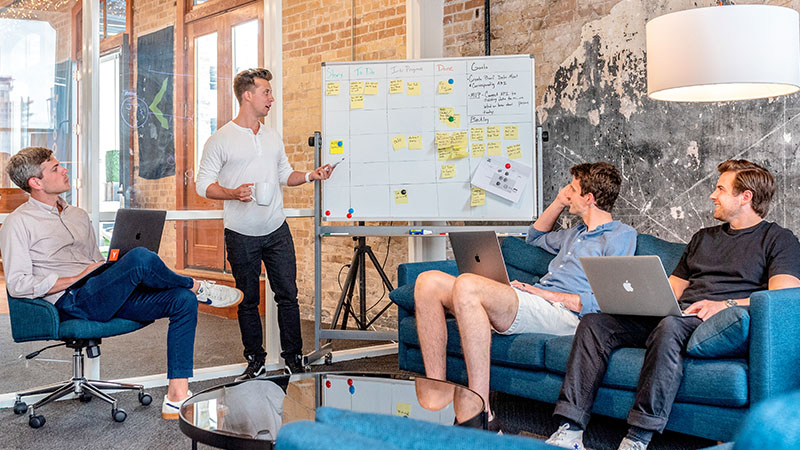 what is business plan and why it is important man giving presentation to people