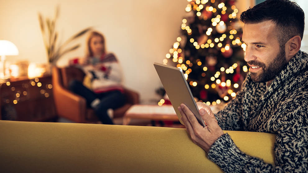man holding a tablet