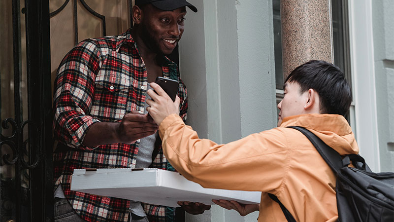 person signing for a package