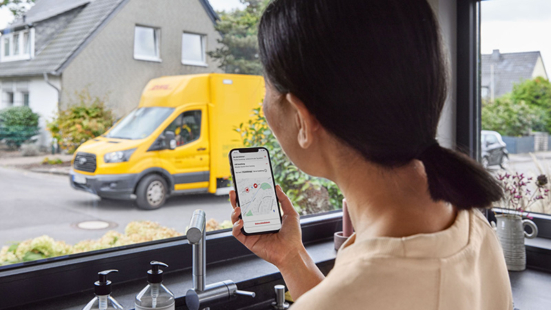 woman tracking parcel on a mobile phone