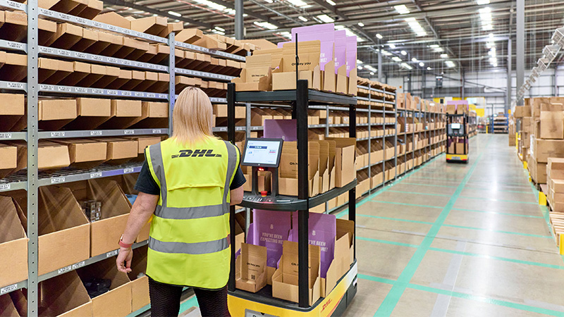 DHL employee in a warehouse
