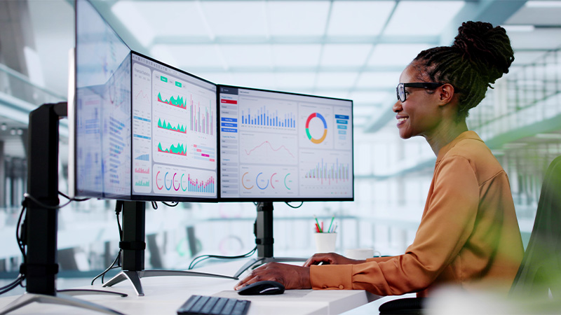 KPI Business Analytics Data Dashboard. Analyst Using Computer