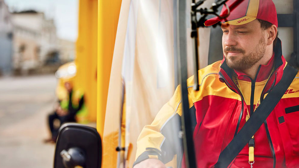 man driving DHL van